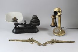 A BRASS CANDLESTICK STYLE TELEPHONE; together with a set of weighing scales and a pair of brass