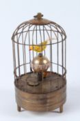 A NOVELTY BIRD CAGE CLOCK. 18cms high.
