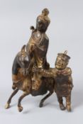 A GILT BRONZE CHINESE WOMAN RIDING A HORSE STATUE SCULPTURE. 22cms high.