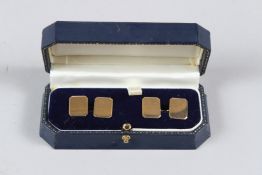 A PAIR OF 9CT GOLD CUT CORNER RECTANGULAR DOUBLE CUFFLINKS.