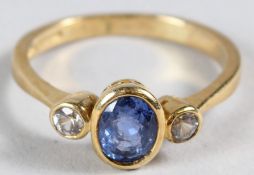 AN 18CT YELLOW GOLD, FINE SAPPHIRE AND DIAMOND THREE STONE RING.