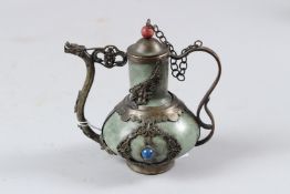 A CHINESE METAL MOUNTED HARDSTONE EWER, four character mark to the base. 12cms high.