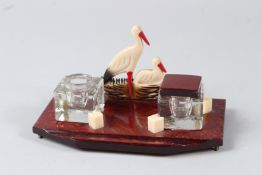 A RARE 1920'S ART DECO BAKELITE (POSSIBLY CHERRY AMBER) INKWELL STAND. Weight without inkwells