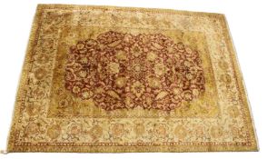 A GOOD LARGE SILK CARPET, cream and red ground with stylised foliate decoration. 370cms x 270cms.