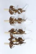 A SET OF FOUR ORMOLU SINGLE BRANCH WALL APPLIQUES, with cut glass prism drops. 28cms high x 12cms