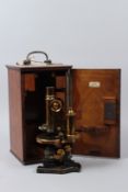 ERST LEITZ, WETZLAR, A LATE 19TH CENTURY BRASS MICROSCOPE, retailed by A. FRAZER, OPTICIAN, 22