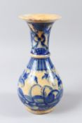A FINE 18TH CENTURY PERSIAN GLAZED POTTERY VASE. 29cms high.