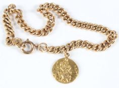 A 14CT GOLD CURB LINK BRACELET, mounted with a yellow metal St. Christopher.