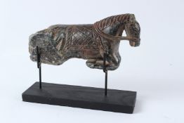 AN INDIAN CARVED GREEN HARDSTONE FIGURE, 19TH / 20TH CENTURY, modelled as the front end of a