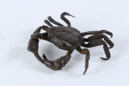 A JAPANESE BRONZE ARTICULATED CRAB. 9cms.