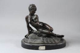 MME LEON BERTAUX. A BRONZE OF A RECLINING FEMALE NUDE, a butterfly on her back, mounted on an oval