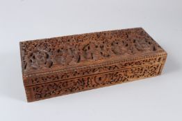 A VERY FINELY CARVED 19TH CENTURY ANGLO INDIAN MAYSORE CARVED SANDALWOOD BOX depicting figural