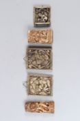 A GROUP OF FIVE INDIAN CARVED BONE PLAQUES depicting erotic scenes. Largest: 8cms x 6cms.