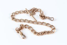 A 9CT GOLD ALBERT CHAIN. 36cms long.