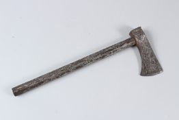 A 19TH CENTURY INDO PERSIAN SILVER INLAID STEEL AXE. 35cms long.