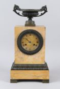 A 19TH CENTURY SIENNA MARBLE AND BRONZE MANTLE CLOCK, with urn shaped finial, the dial signed