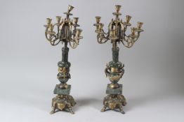 A PAIR OF MARBLE AND ORMOLU SIX BRANCH, SEVEN LIGHT CANDELABRA. 47cms high.