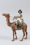 A 19TH CENTURY AUSTRIAN ORIENTALIST BERGMAN COLD PAINTED BRONZE FIGURE of a Nubian on camel, faint