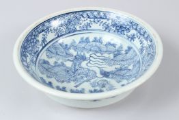 AN EARLY 20TH CENTURY CHINESE BLUE AND WHITE BOWL. 27cms diameter.