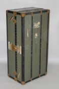 LOUIS VUITTON, A WARDROBE TRUNK, the interior fitted with storage compartment, drawers and