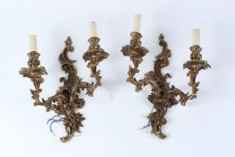 A PAIR OF HEAVY CAST ORMOLU ROCOCO STYLE TWIN-BRANCH WALL APPLIQUES. 36cms high x 29cms wide.