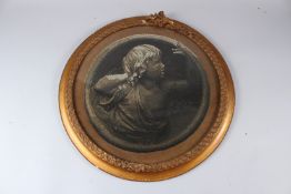 A 19TH CENTURY BEAD WORK CIRCULAR PANEL, depicting the bust of a classical youth, in a gilt frame.