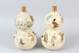 A GOOD PAIR OF MEIJI PERIOD SATSUMA DOUBLE GOURD VASES, painted and gilded all over with figures