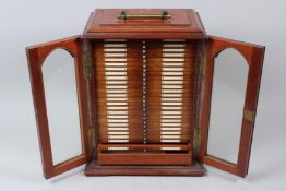 A GOOD 19TH CENTURY MAHOGANY TWO-DOOR TABLE TOP CABINET, containing 25 numbered drawers of