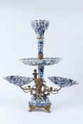 A BLUE AND WHITE PORCELAIN CENTREPIECE, with ormolu mounts. 57cms high.