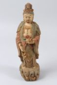 A CHINESE WOOD GUANYIN FIGURE. 29cms high.