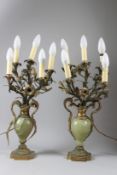 A PAIR OF ONYX AND ORMOLU TWIN-HANDLED URN SHAPED TABLE LAMPS, each with five naturalistic style