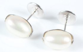 A PAIR OF 18CT WHITE GOLD AND PEARL EARRINGS.