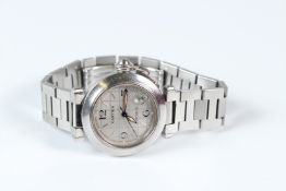 A GENTLEMAN'S CARTIER STAINLESS STEEL WRISTWATCH, with bracelet strap, boxed.