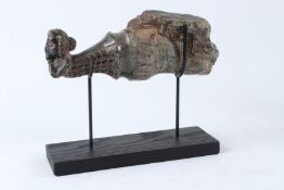 AN INDIAN CARVED GREEN HARDSTONE FIGURE, 19TH / 20TH CENTURY, modelled as the front end of a