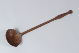 AN UNUSUAL 19TH CENTURY ISLAMIC, POSSIBLY PERSIAN, CALLIGRAPHIC TALISMANIC CEREMONIAL LADLE. 34cms