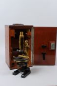 CARL ZEISS, JENA, A 19TH CENTURY BRASS MICROSCOPE, No. 26512, in a fitted mahogany case with