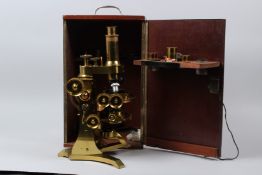 ROSS, LONDON, A 19TH CENTURY BRASS MICROSCOPE, in a mahogany case with accessories, microscope