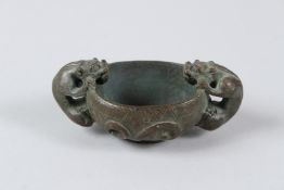 A CHINESE BRONZE INCENSE BURNER. 9cms high.