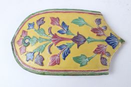 A 19TH CENTURY INDIAN CERAMIC TILE, KASHMIR. 24cms x 14cms.