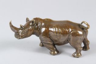 A BRASS RHINO. 16cms.