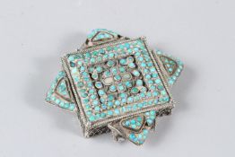 A FINE 19TH CENTURY TIBETAN TURQUOISE INSET SILVER MOUNTED AMULET CASE. 9cms wide.
