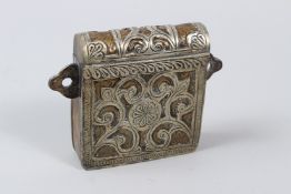 A NORTH AFRICAN CARTRIDGE CASE.