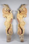 A LARGE PAIR OF 19TH CENTURY SOUTH INDIAN OR SRI LANKAN POLYCHROMED CARVED WOODEN MAKKARA DRAGONS.