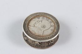A CHINESE WHITE METAL INK BOX. 5cms.