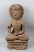 A LARGE, POSSIBLY EARLY INDIAN, CARVED STONE BUDDHA. 75cms high.