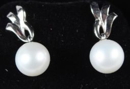 A PAIR OF 18CT WHITE GOLD AND PEARL EARRINGS.