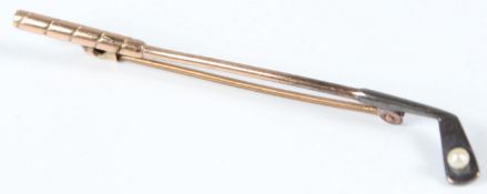 A 9CT GOLD, SILVER AND PEARL GOLF CLUB SHAPED BROOCH, in a fitted case, retailer R. Stewart Ltd,