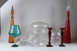A COLLECTION OF GLASSWARE to include a pair of ruby tinted candlesticks, two coloured glass