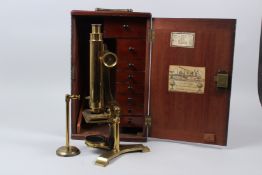 J. B. DANCER, MANCHESTER, A 19TH CENTURY BRASS MICROSCOPE, in its original fitted mahogany case with