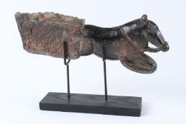 AN INDIAN CARVED GREEN HARDSTONE FIGURE, 19TH / 20TH CENTURY, modelled as the front end of a